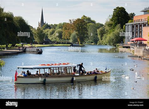 A river cruise ship taking tourists and visitors along the River Avon in Stratford upon Avon on ...