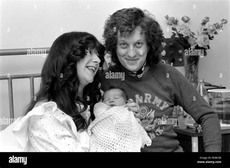 Pop Singer: Slade: Noddy In Wonderland: Noddy Holder with his wife Leeanra, 23 and their baby ...