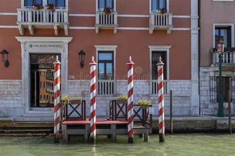 View of the Red and White Poles of the Pontoon of the Palazzo Barocci in Venice Editorial Photo ...