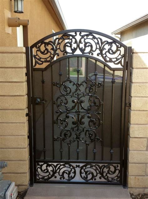 Pin by Lyla TLars on Side gate | Iron garden gates, Iron gate design, Wrought iron front door