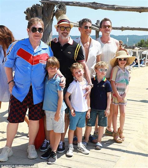 Elton John and David Furnish holiday with sons Elijah and Zachary ...