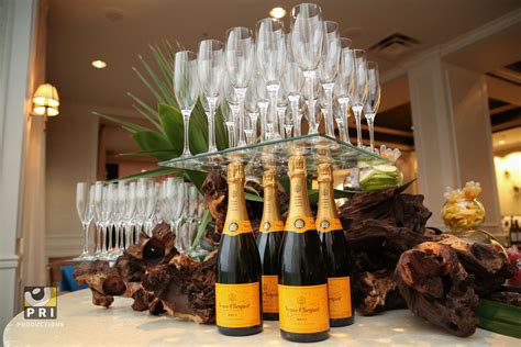 Champagne display for a tropical themed dinner party | Dinner party themes, Dinner themes, Drink ...