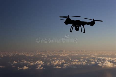 Innovation Concept. Silhouette of Drone Flying on Sunset Stock Image - Image of helicopter ...