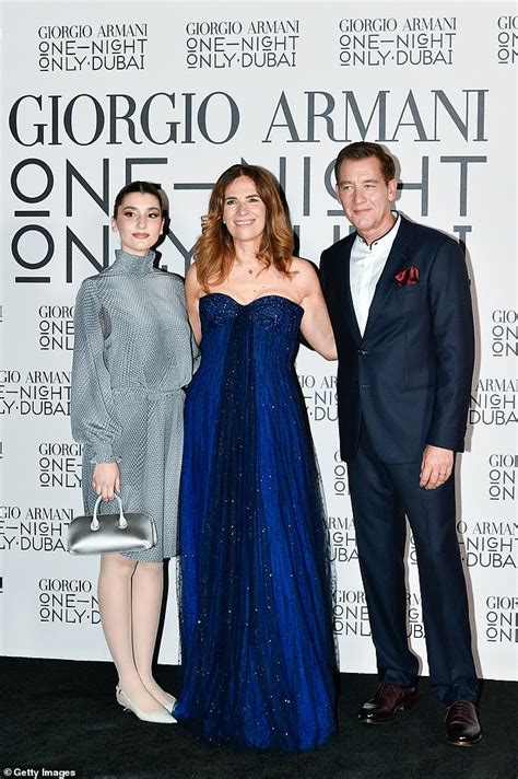 Clive Owen and daughter Eve pose with Roberta Armani at the One Night Only Dubai fashion show ...