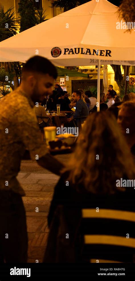 café scene night time Cagliari Sardinia Italy Stock Photo - Alamy