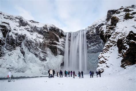 SKOGAFOSS/ICELAND - FEB 02 : View of Skogafoss Waterfall in Winter on Feb 02, 2016. Unidentified ...