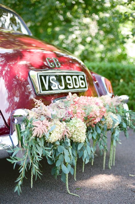 Vintage Car with Floral Garland by Bo Boutique Flowers - Elizabeth Anne Designs: The Wedding Blog