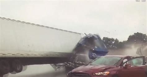 Semi-truck crashes into tow truck, rolls over Wisconsin highway