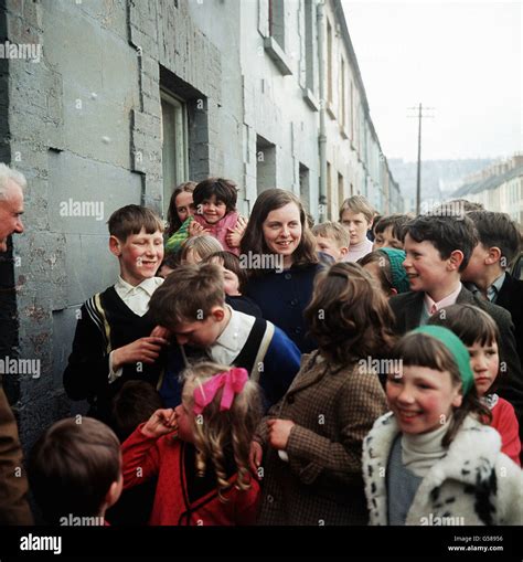 BERNADETTE DEVLIN 1969: The MP for Mid-Ulster, Bernadette Devlin, 22, surrounded by school ...