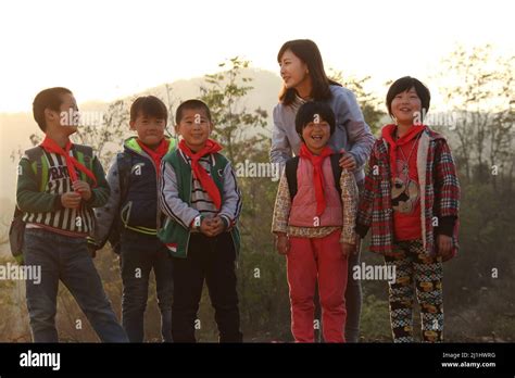 Rural female teachers and students in the wild Stock Photo - Alamy