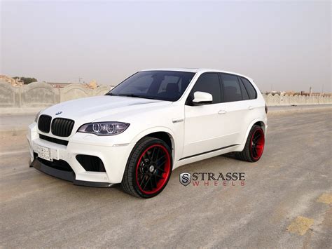 White BMW X5 on Contrasting Matte Black Strasse Wheels Featuring Red Lip — CARiD.com Gallery