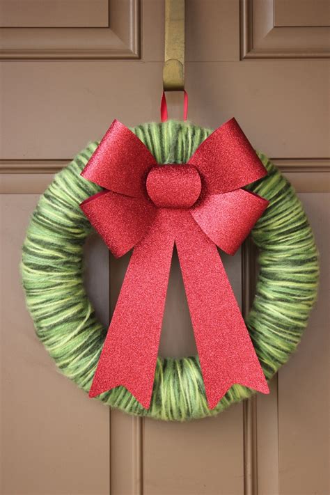 Green Multicolored yarn and a bow from Joann Fabric | Holiday crafts, Wreath decor, Christmas ...