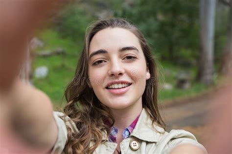 Smiling Woman Taking Selfies Stock Image - Image of taking, scenic: 68298693