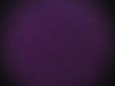 Dark purple old velvet fabric texture used as background. Empty purple ...