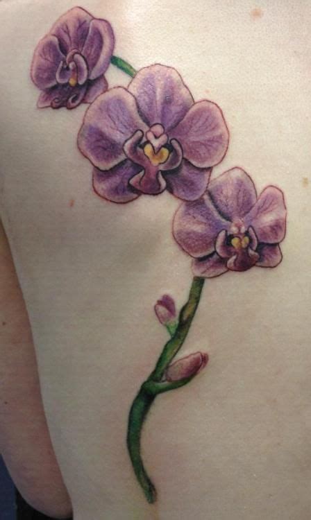 Orchid tattoo by Pony Lawson | Orchid tattoo, Purple orchid tattoo, Orchid flower tattoos