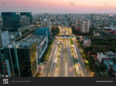 Aerial view of Gurugram financial district with tall building at dusk ...