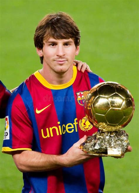 Leo Messi with golden ball editorial image. Image of award - 20426705