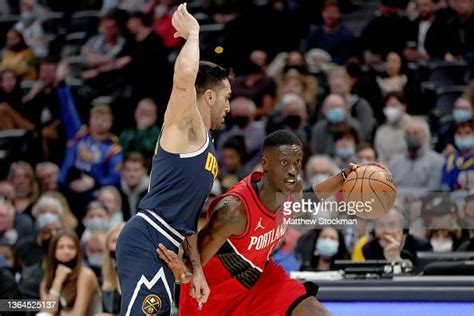 Tony Snell of the Portland Trail Blazers drives against Facundo... News Photo - Getty Images