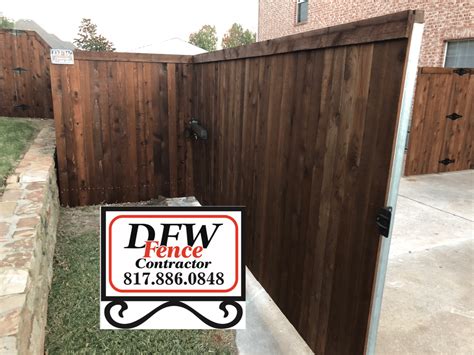 Automatic Wooden Driveway Gates | DFW Fence Contractor