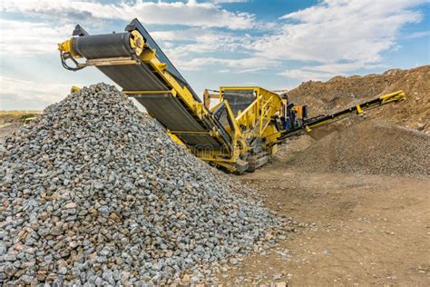 Stone Crusher Machine in a Quarry or Open-pit Mine, To Transform into ...