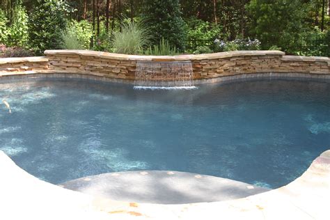 Pool with Waterfall | Waterfalls backyard, Pool waterfall, Pool landscaping