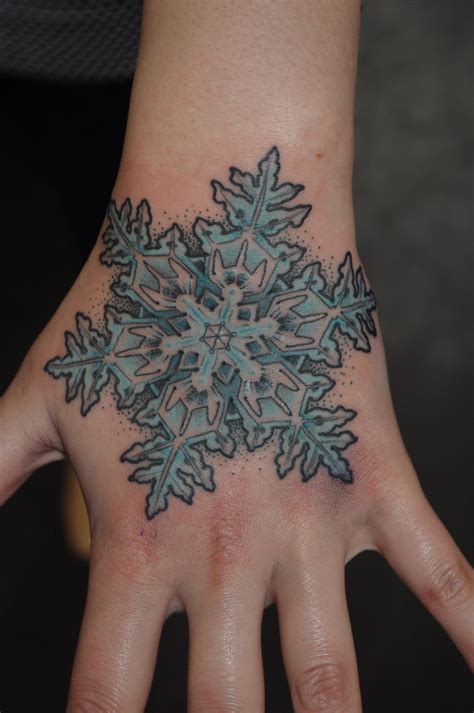 Snowflake tattoo | Snow flake tattoo, Hand tattoos, Tattoo trends