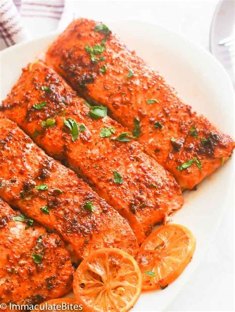 Oven Baked Salmon – moist and flaky highly seasoned salmon fillets with a lemony and spicy kick ...