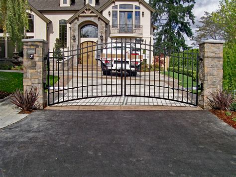 Double swing gate fabricate at an angle to account for the uphill slope. #custom #gate #security ...