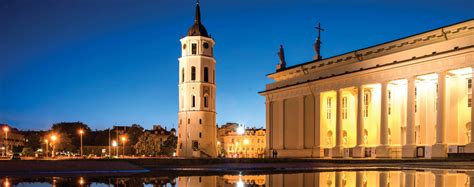 Download Caption: Stunning view of Vilnius Cathedral Square at dusk ...