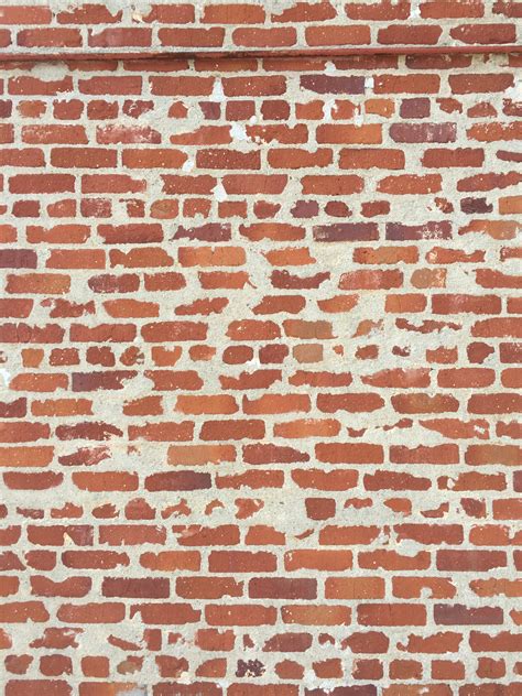 Flat brick wall with sloppy grout | Free Textures