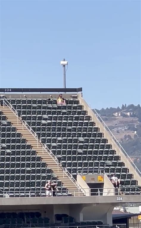 Oakland A's fans return to section of alleged sex act with signs