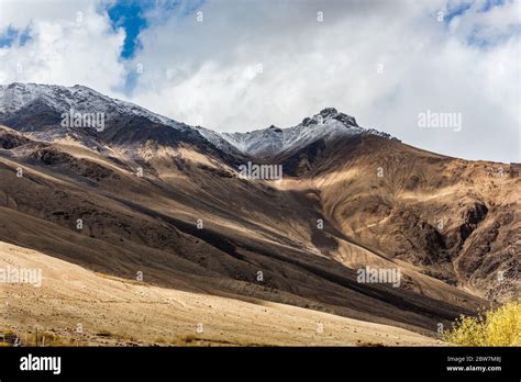 Landscape of snow mountains in Leh Ladakh with cloudy sky Stock Photo - Alamy