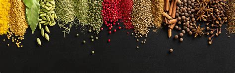 Indian condiments on black table in high resolution. Spices for cooking ...