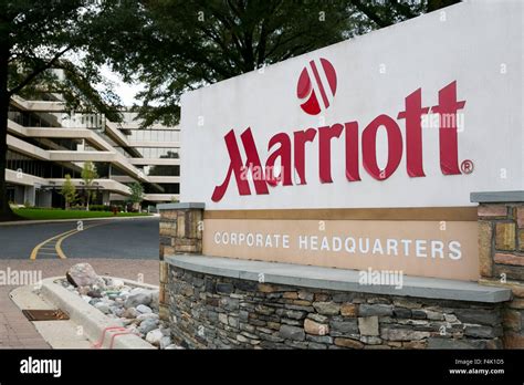 A logo sign outside of the headquarters of Marriott International Stock ...