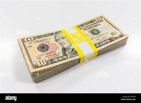 Pack of ten dollar bills with $1000 paper currency strap Stock Photo - Alamy