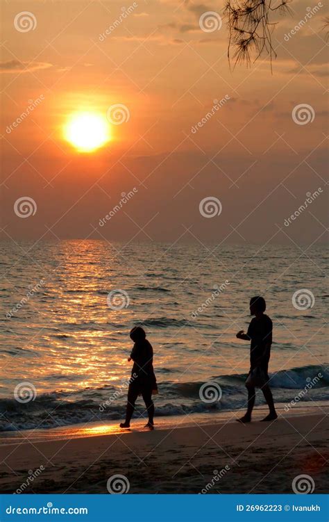 A Couple Walking in the Sunset Stock Image - Image of foam, active: 26962223