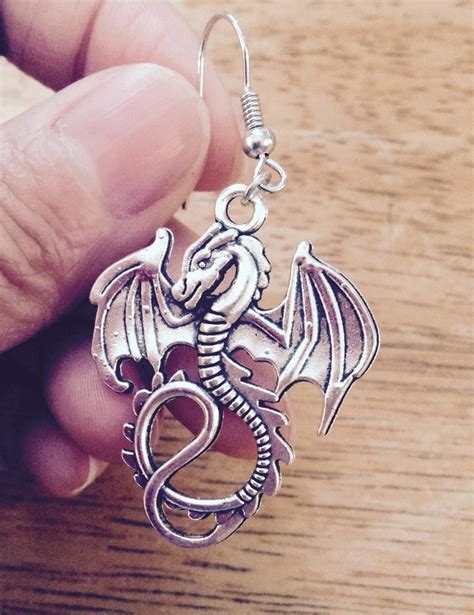 Silver Plated Wing Dragon Earring | Dragon earrings, Cute ear piercings ...