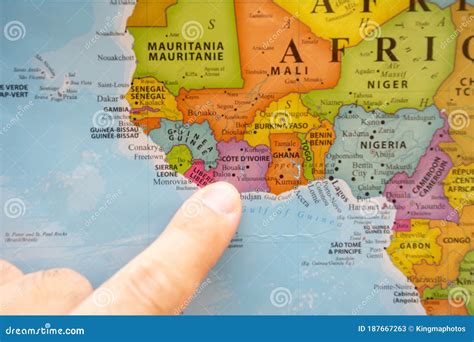 Finger Pointing To a Colorful Country Map in English and French Ivory Coast Cote D`Ivoire Stock ...