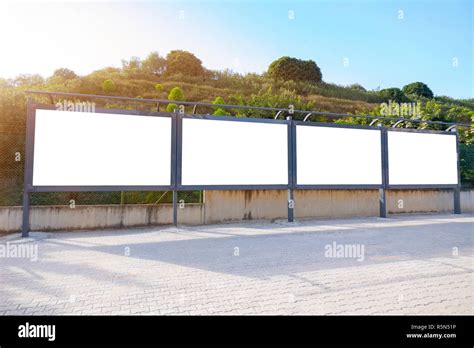 Four blank frame billboard mockup Stock Photo - Alamy