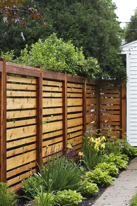 13 Pallet Fence Designs to Improve Your Backyard