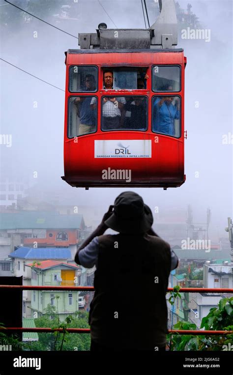 Gangtok, Sikkim - June 16 2022, Tourists enjoy a ropeway cable car ride over Gangtok city ...