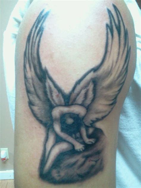 Angel Tattoo | Tattoos, Angel tattoo, Flower tattoo