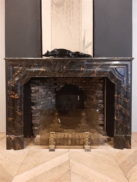 Antique black marble fireplace - Piet Jonker