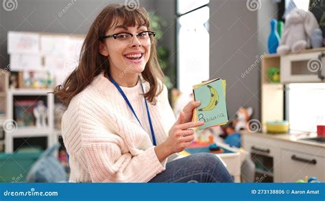 Young Caucasian Woman Teaching Words at Kindergarten Stock Photo - Image of children, preschool ...