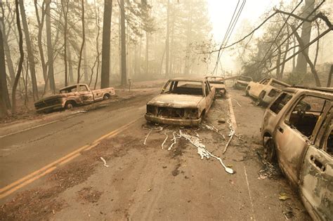 Burnt out vehicles litter the roads of Paradise, CA. | California Wildfires in Ventura and Butte ...