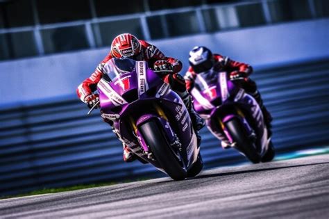 Premium AI Image | a pair of motorcyclists are racing side by side moto gp