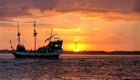 Pirate Ship at Sunset Photograph by Nikki Brubaker