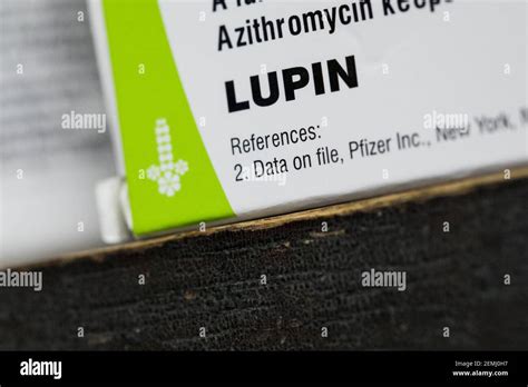 A Lupin Pharmaceuticals logo is seen on prescription pharmaceutical packaging photographed in a ...