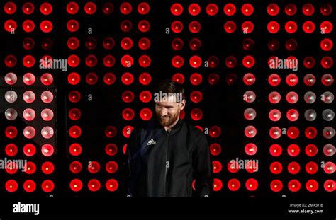 FC Barcelona's Lionel Messi smiles during a comercial event in Barcelona, Spain, Friday, Jan. 26 ...