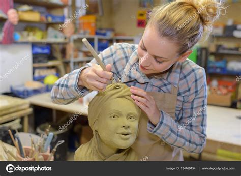 Female sculptor at work Stock Photo by ©photography33 134469454